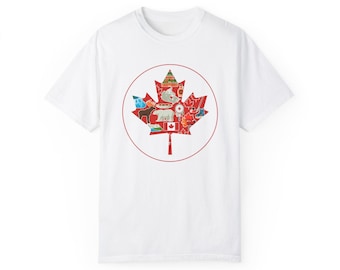 May include: White t-shirt with a red maple leaf design. The leaf is filled with small images of Canadian icons, such as a moose, a beaver, a polar bear, and a hockey stick.