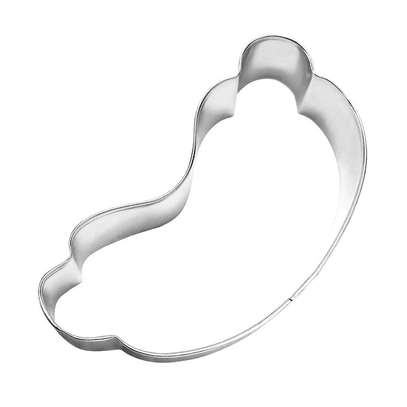 May include: A shiny, silver-colored metal cookie cutter in the shape of a foot. The cutter has a smooth, curved design, with a rounded heel and toes. The cutter is designed for baking and crafting.