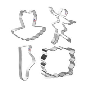 May include: Set of four metal cookie cutters shaped like a ballerina, a tutu, a ballet slipper, and a square frame. The cutters are made of silver-colored metal.
