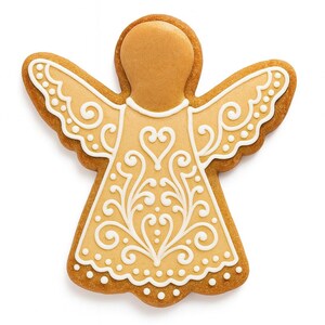 May include: A light brown gingerbread cookie shaped like an angel, decorated with intricate white icing patterns. The design features swirling filigree, small dots, and a heart shape on the torso, with scalloped edges along the wings and base.