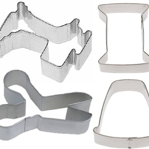 May include: Four metal cookie cutters shaped like a sewing machine, a spool of thread, a pair of scissors, and a thimble.