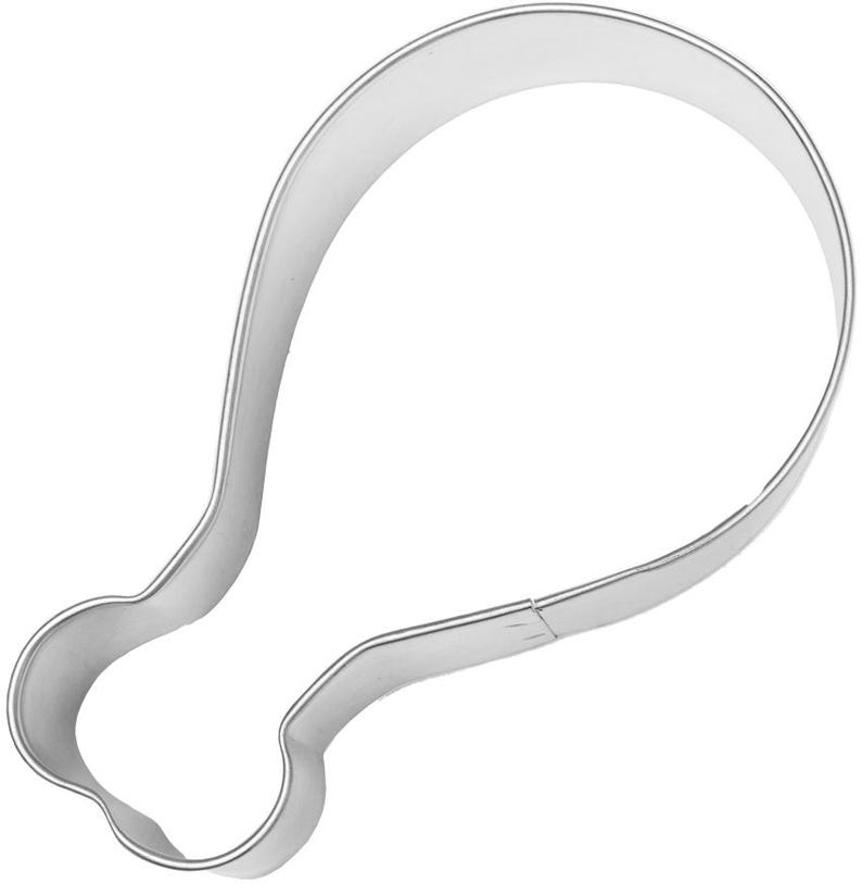 May include: A shiny, silver-colored metal cookie cutter in the shape of a chicken drumstick. The cutter has a smooth, rounded design, perfect for creating themed cookies or pastries.