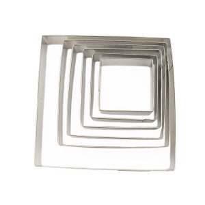 May include: Set of five stainless steel square cookie cutters, nested inside each other, with the largest cutter on the outside and the smallest cutter on the inside.