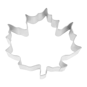 May include: A silver metal cookie cutter shaped like a maple leaf.