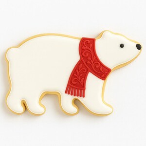 May include: A polar bear cookie with white icing and a red scarf with a decorative pattern. The cookie has a yellow outline and black eyes. The bear is in a walking pose.