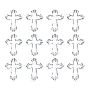 May include: Twelve silver-colored cross-shaped cookie cutters arranged in a grid pattern. Each cutter has a detailed, scalloped edge design. The cutters are made of a shiny, metallic material and are set against a plain white background.