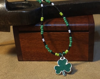 Item #12-35 -Beaded Necklace - Shamrock on a Green, White, and Black Strand