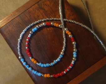 Item #12-18 -Beaded Necklace - Light Blue, Orange, Red and Silver Strand
