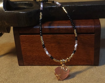 Item #12-38 -Beaded Necklace - Gold Filled Wire Wrapped Pink Heart on a Pink, Black, White and Gold Strand