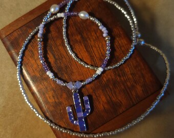 Item #12-27 -Beaded Necklace - Purple Cactus on a Light Purple, White, and Silver Strand
