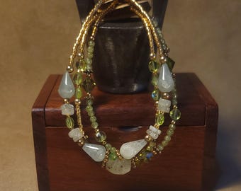 Item #15-13 -  Layering  Bracelets - Quartz, Peridot and Swarovski Crystals with detachable clasps