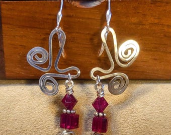 Item #6-12 - Silver Earrings - Hammered Swirl Earrings with Red Swarovski Crystals
