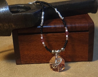 Item #12-33 -Beaded Necklace - Sterling Silver Wrapped Pink Crystal on a Pink, Black, White and Silver Strand