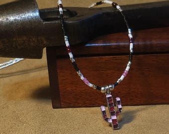 Item #12-29 -Beaded Necklace - Orange Cactus on a Orange, White, Yellow, Black and Silver Strand