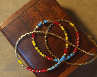 Item #12-22 -Beaded Necklace - Light Blue, Red, Yellow and Gold Strand