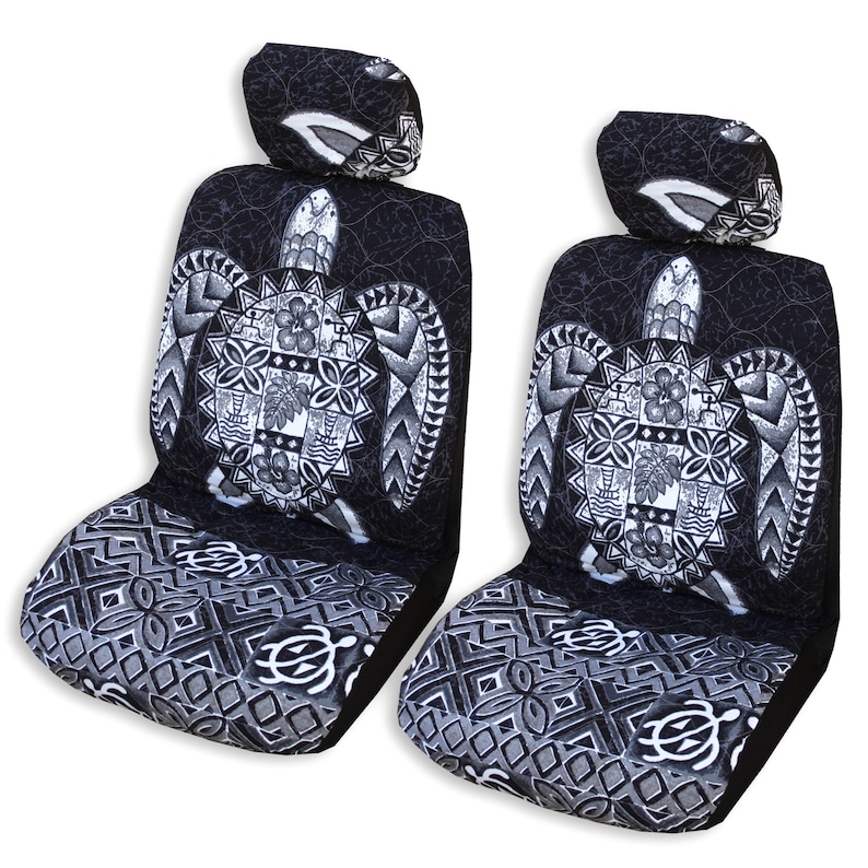 May include: Two black and white car seat covers with a Hawaiian turtle design. The covers feature a large turtle with a geometric pattern and a smaller turtle design on the bottom.