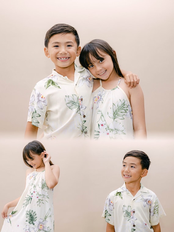 Boy and girl wearing matching dresses hot sale