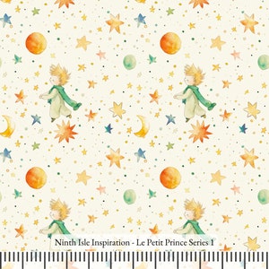 May include: A white fabric with a repeating pattern of a small boy, stars, moons, and planets. The boy is wearing a green scarf and a yellow shirt. The text "Ninth Isle Inspiration - Le Petit Prince Series 1" is at the bottom of the fabric.