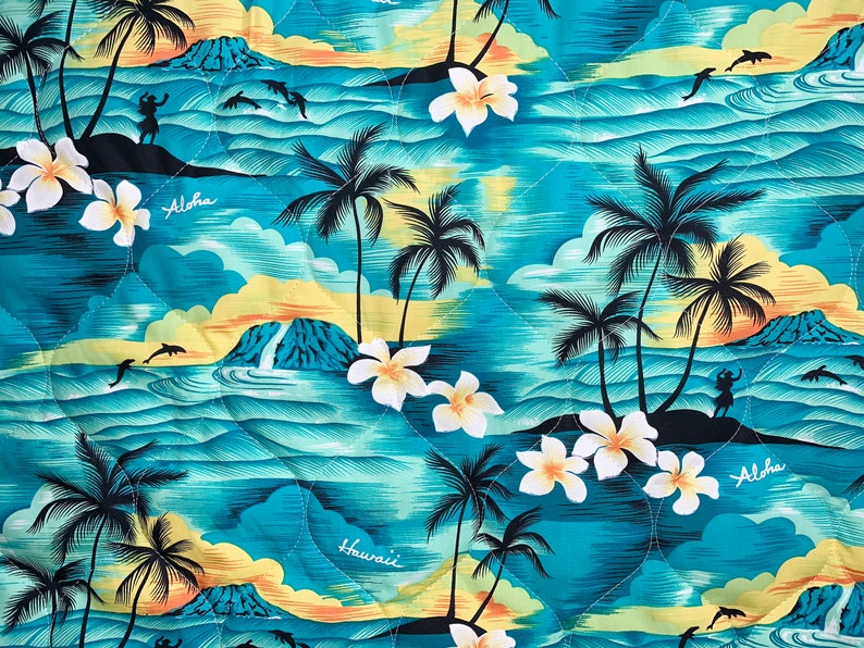 May include: A blue and yellow Hawaiian-themed fabric featuring palm trees, mountains, and the words "Aloha" and "Hawaii".