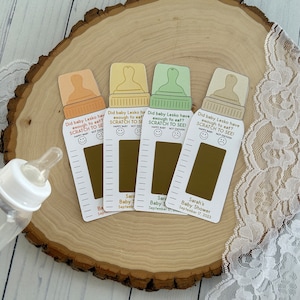LOT de 10 - Jeu de grattage pour biberon de douche de bébé, jeu de douche de bébé amusant, grattage de douche de bébé : disponible dans n'importe quelle couleur.