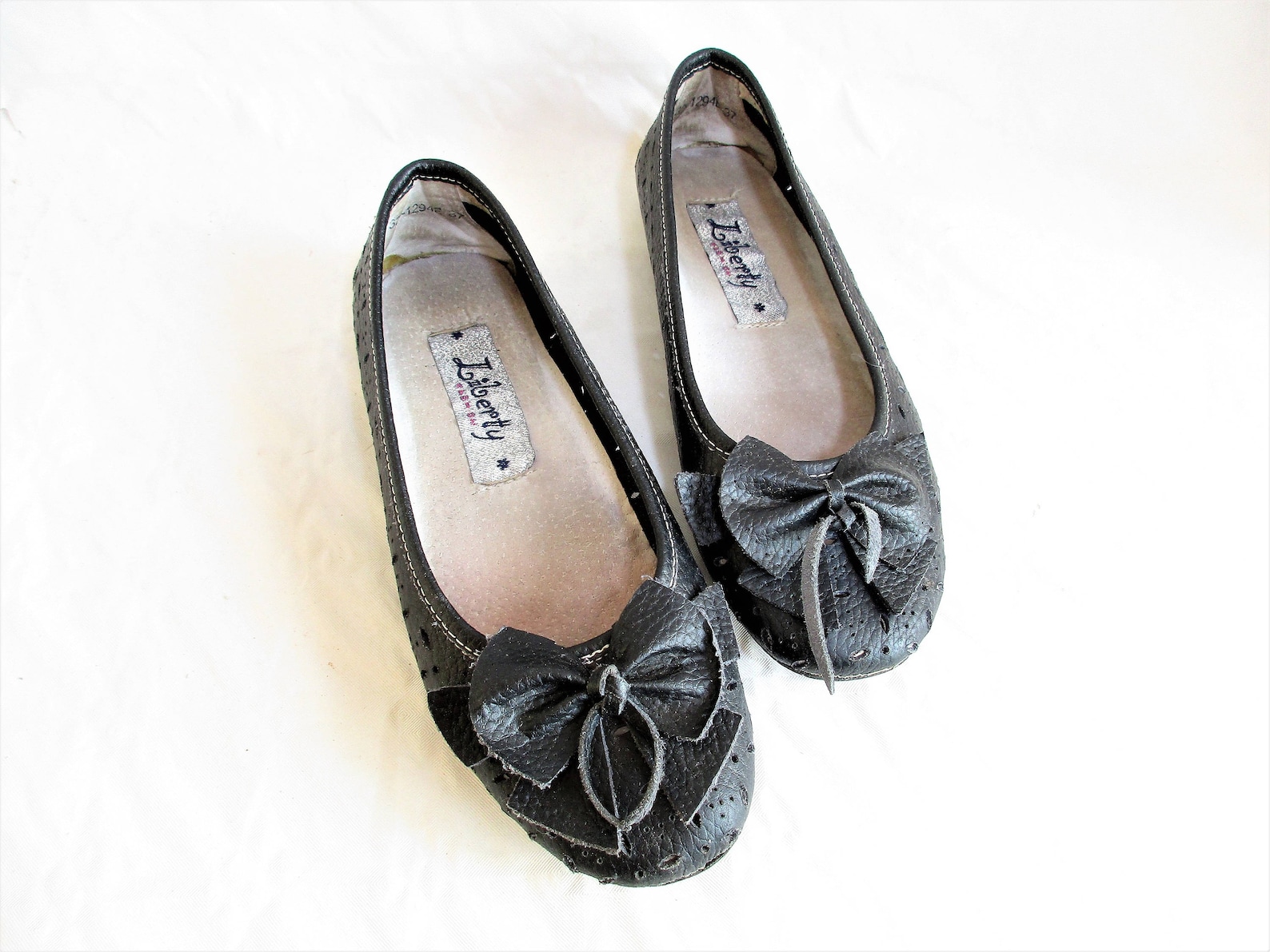 vintage italian perforated charcoal leather ballet flats with ribbon embellishment , size : eu 37 / us women's 6 1/2 vintage italian perforated charcoal leather ballet flats with ribbon embellishment , size : eu 37 / us women's 6 1/2
