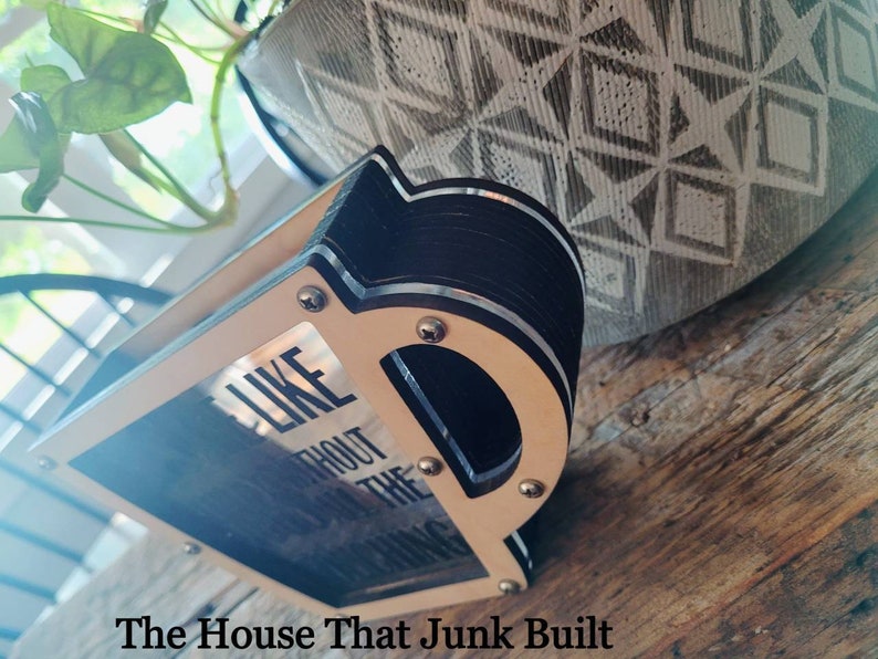 May include: Wooden coaster set with a black and white design. The coasters feature the text "I like it without all the "thing" ".