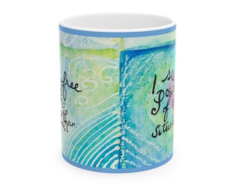 Pode incluir: Uma caneca azul e verde de aquarela com o texto "Vejo o lado positivo de cada situação" em escrita cursiva preta.