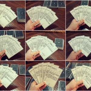 Peut inclure: Un ensemble de cartes avec diff&eacute;rents titres, dont "Mur de Moutons", "Trouver un Coursier", "Dreadnought", "Sommeil du Loup", "Boule de Feu" et "Condamnation". Les cartes sont blanches avec du texte noir et sont dispos&eacute;es en &eacute;ventail.