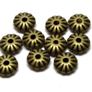 20 x UFO, discus, approx. 9 x 4 mm, bronze-coloured