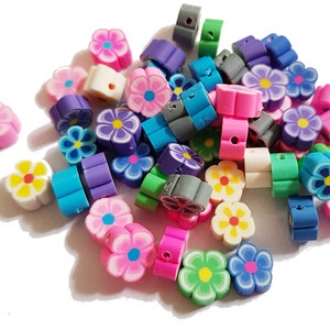 50 polymer beads flowers, blossoms, flowers mixed, approx. 9 x 4 mm