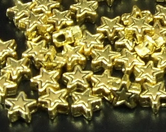 50 stars, asterisks, approx. 6 mm, antique gold.