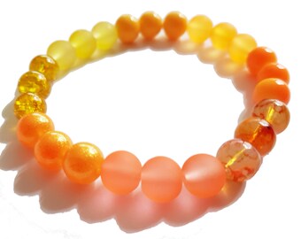 Bracelet made of glass beads in orange and yellow Summer bracelet