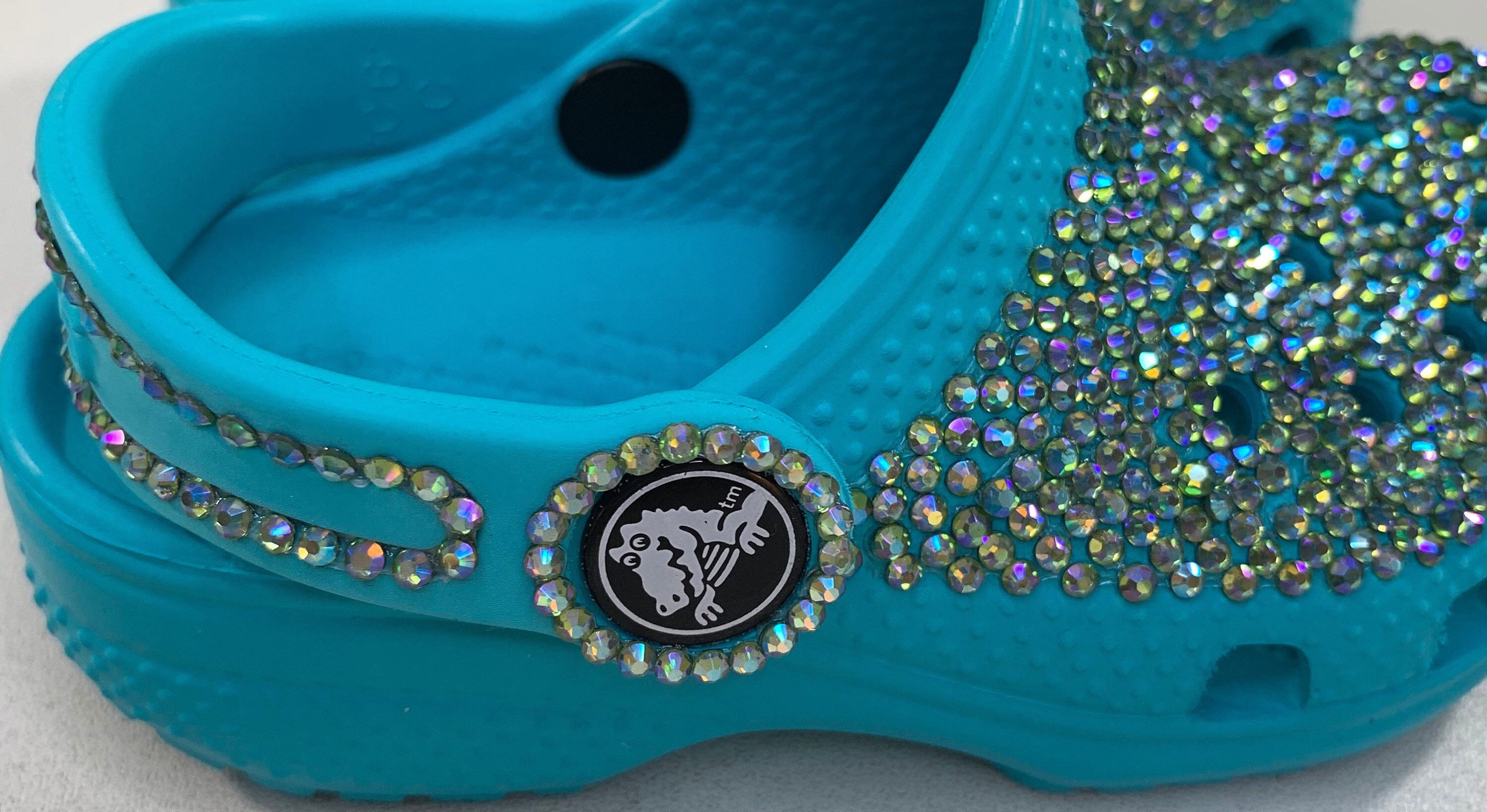 turquoise glitter crocs