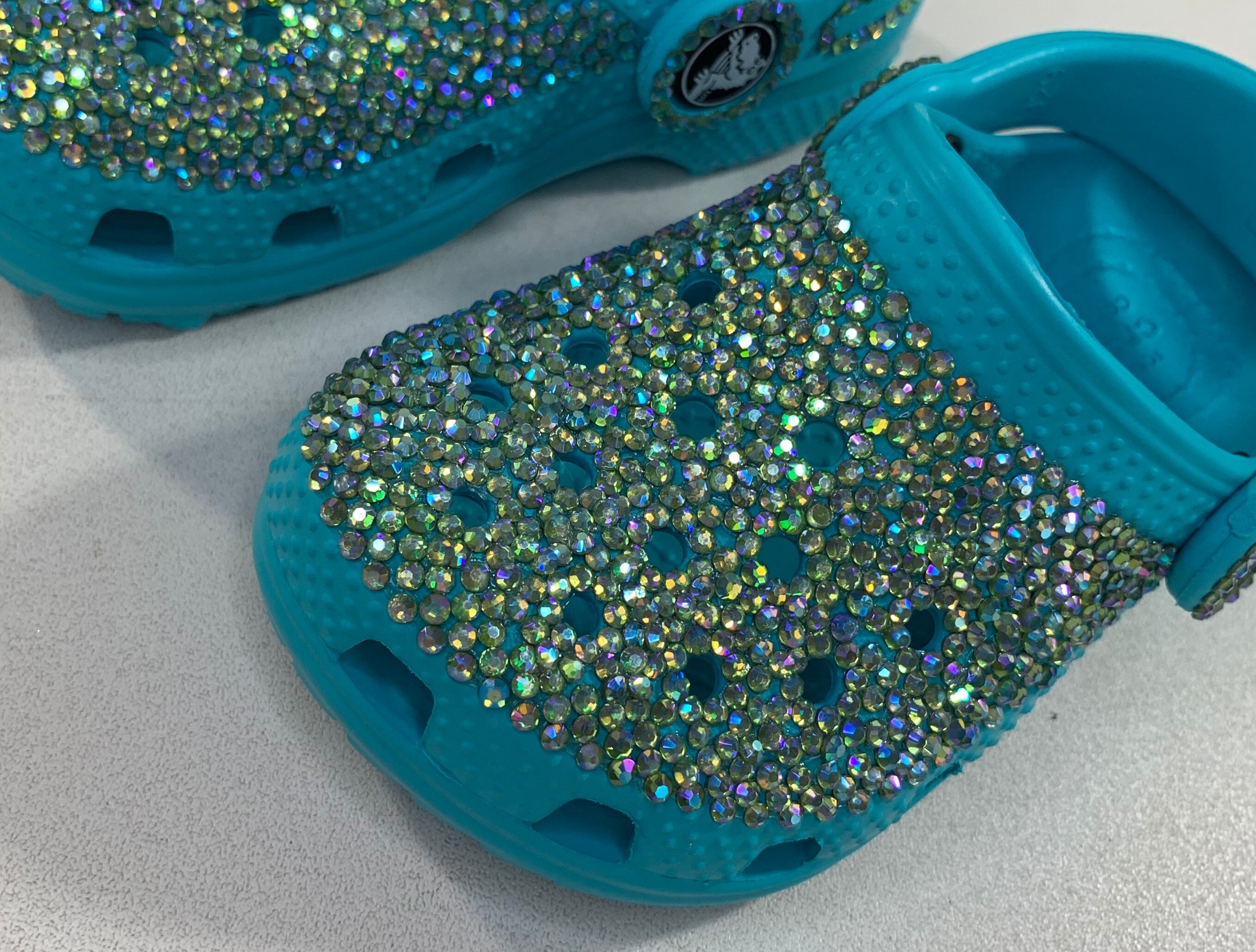 turquoise glitter crocs