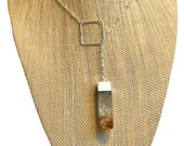 Raw Citrine square bar pendulum lariat necklace on sterling silver chain sterling silver octagon ring center piece.