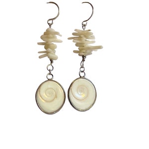 Shiva eye shell earrings with vintage recycled stick coral on hypoallergenic ear wires. Vacation inspiration.