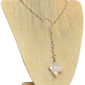 Quartz Crystal Merkaba pendulum lariat Y necklace with sterling silver ring center piece & silver alternating disc chain. Sacred Geometry.