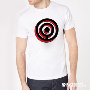 May include: A white t-shirt with a black and red concentric circle design.