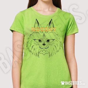 May include: A lime green t-shirt with a black and white illustration of a cat with the word "NOOSKY" printed in orange on the front.