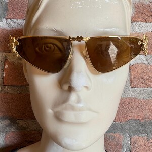 Moschino by Persol MM503 Vintage Gold Tone Triangular Frame Sunglasses Cherub Angel Wings Heart decors NOS 1990s