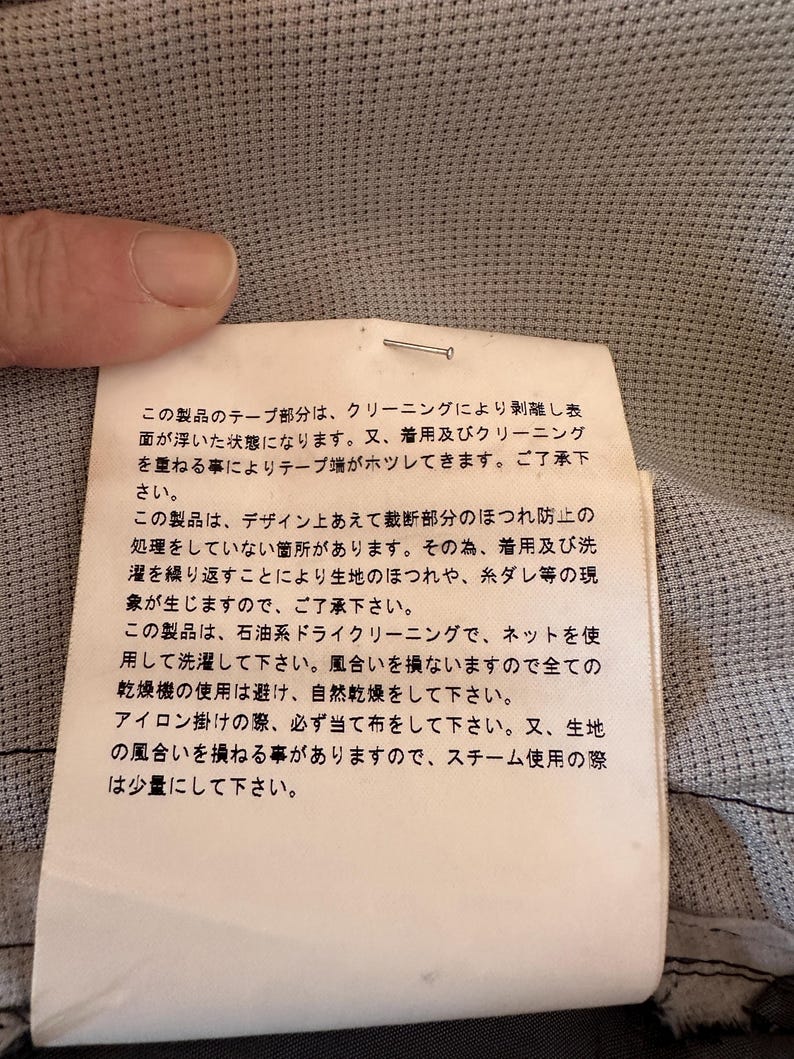 May include: A set of three ceramic mugs with a speckled, matte finish. The mugs are in shades of cream, light gray, and dark gray. Each mug has a simple, minimalist design, perfect for coffee or tea.