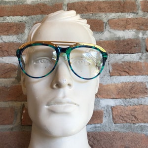 vintage derapage sunglasses, multicolor plastic and gold details, hip hop, italian designer eyewear, unisex, 90s style
