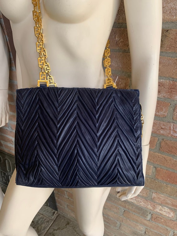 Vintage Gianni Versace genuine black leather Kelly style bag with Meda –  eNdApPi ***where you can find your favorite designer  vintages..authentic, affordable, and lovable.