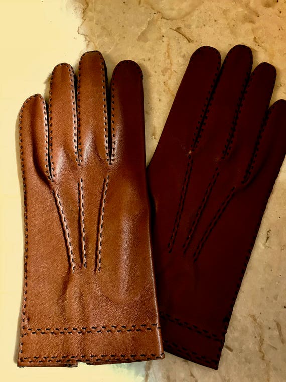 size 7 and 1/4 gloves in fine tobacco-colored leather, with Black stitching, hand-finished, old stock