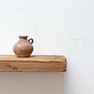 Rustic Reclaimed Wood Floating Shelf: Handcrafted Sustainable Decor