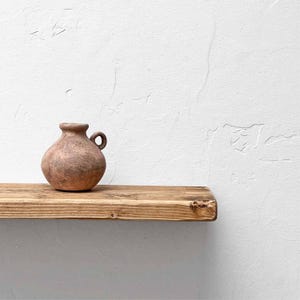 Rustic Reclaimed Wood Floating Shelf: Handcrafted Sustainable Timber