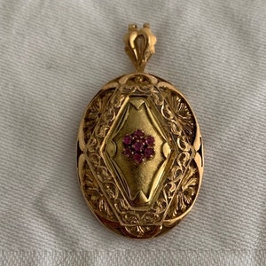 Antique gold hanger with ruby cluster