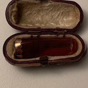 Antique amber and gold cigar holder