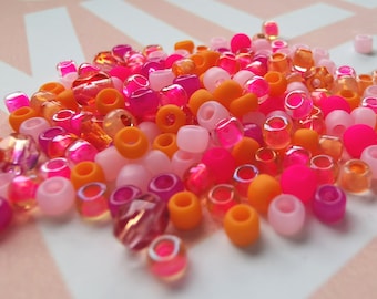 Perles de graines Toho - Matubo - néon - 15g - 'rose orange' - mélange spécial charmone - mélange de perles de verre