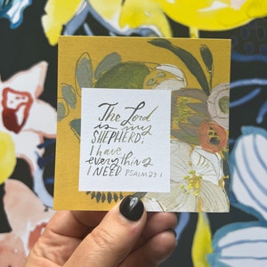 May include: A yellow card with a floral design and the text "The Lord is my SHEPHERD, I have everything I NEED PSALM 23:1"